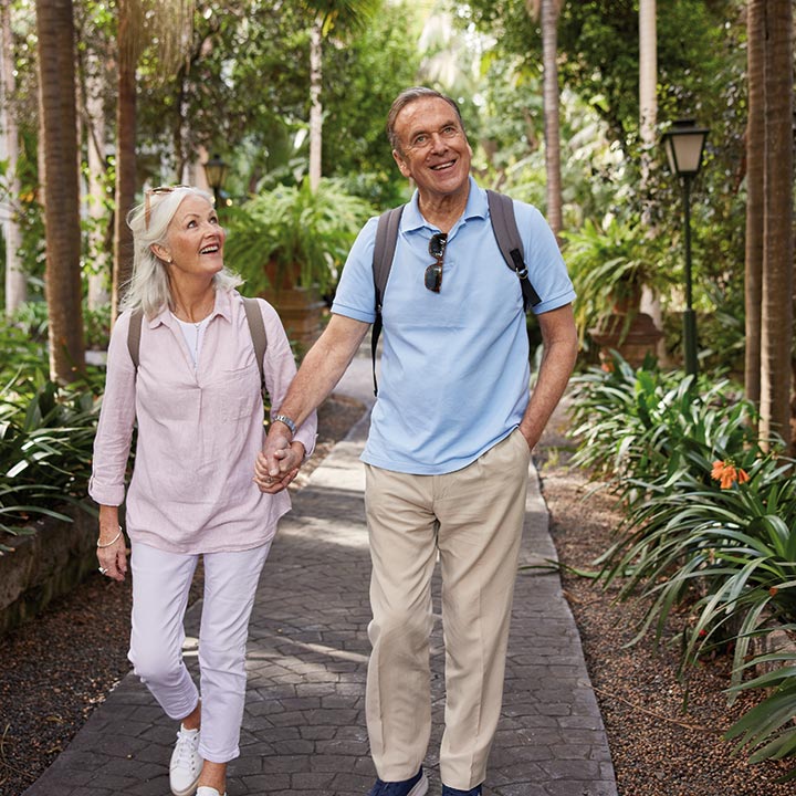 A couple walking through the Arucas Los Jardines de la Marquesa (The Duchess Gardens) in Gran Canaria A couple walking through the Arucas Los Jardines de la Marquesa (The Duchess Gardens) in Gran Canaria